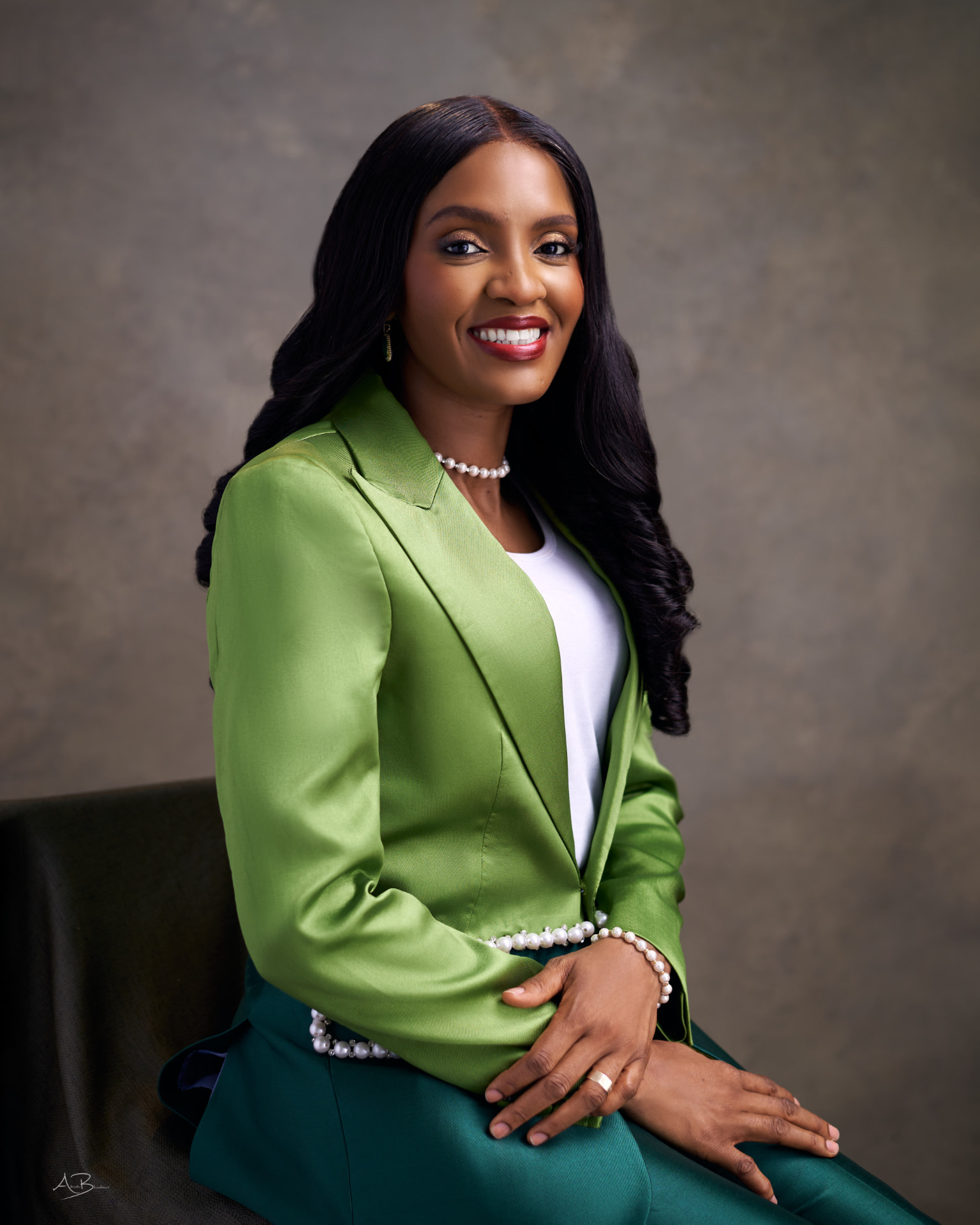 Rev. Dr. Bimbo Mesele in a green jacket
